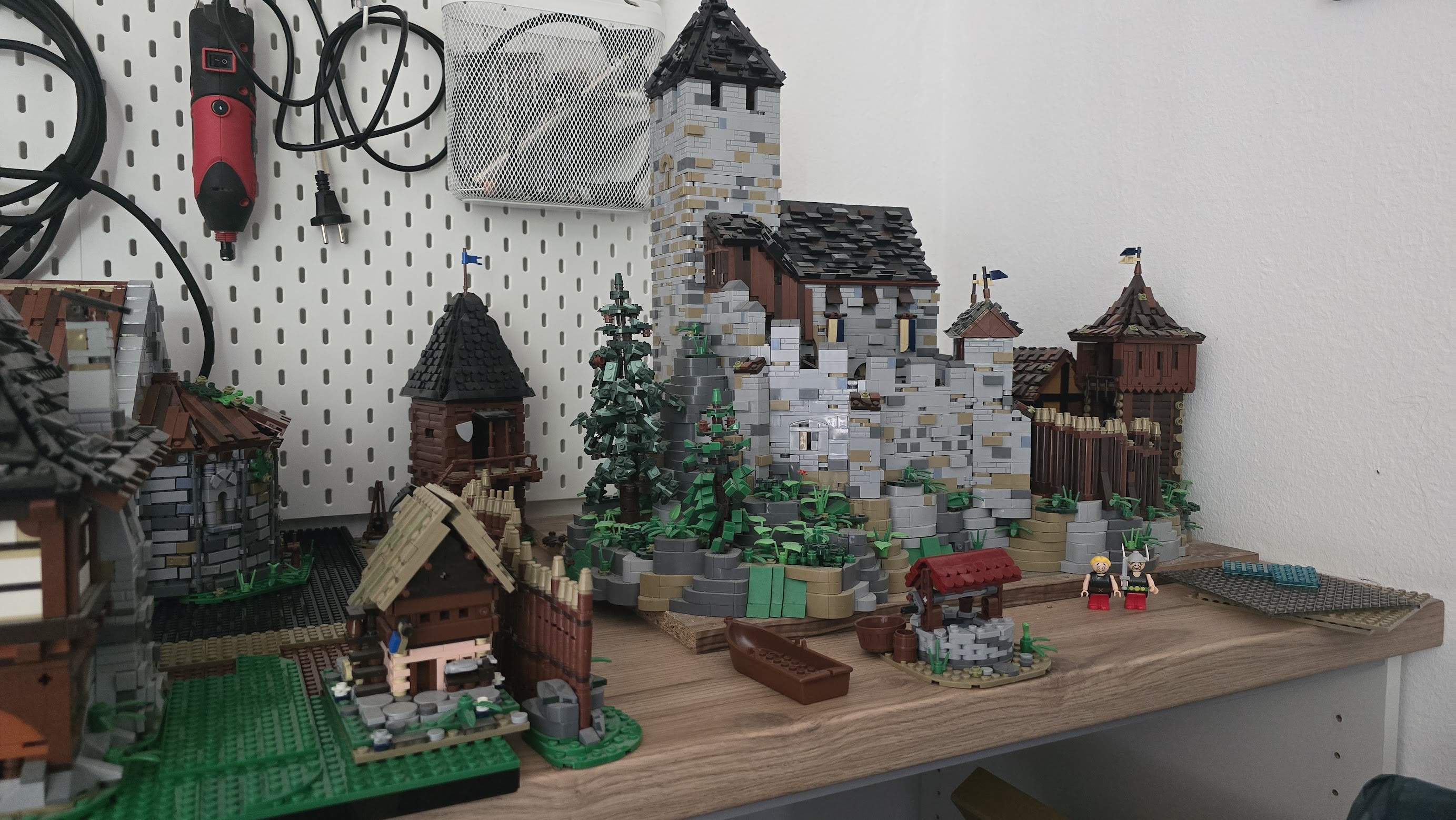 Lego castle with tools in the background